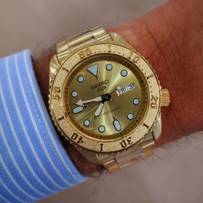 Seiko 5 Sports Superman SRPE74K1 Automatic 100M Full Gold Tone Hardlex  Crystal Glass Stainless Steel Gents